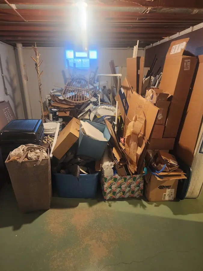 Roll-off dumpster container at job site for Construction Dumpster Rental in Normal